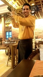 My friend shaking up a Paan Shot to bring an end to my experience